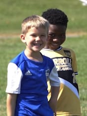 Two Soccer Kids Smiling